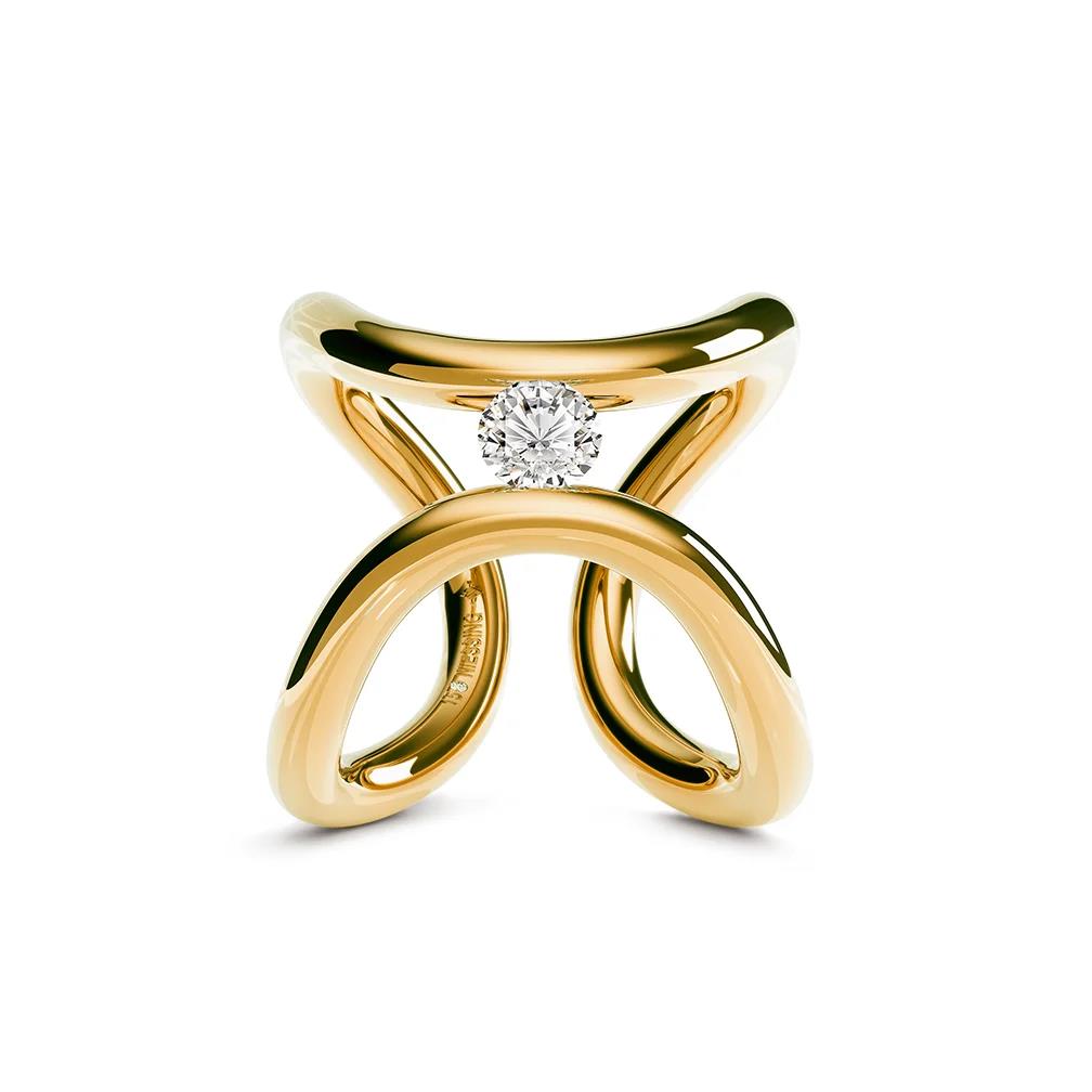 een 18 krt geelgouden spanring Niessing, model Ara met een diamant briljant geslepen 0.52 crt F VS2