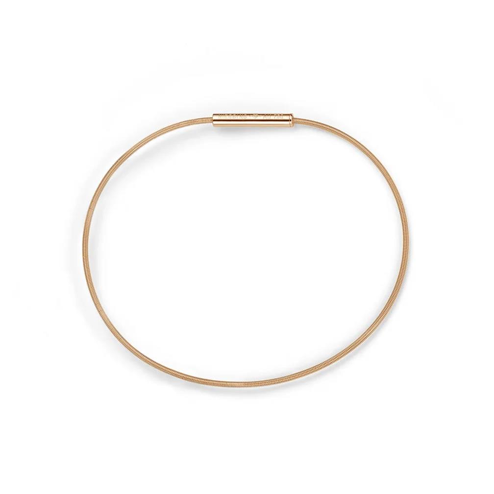 Een 18 krt geelgouden armband van Niessing