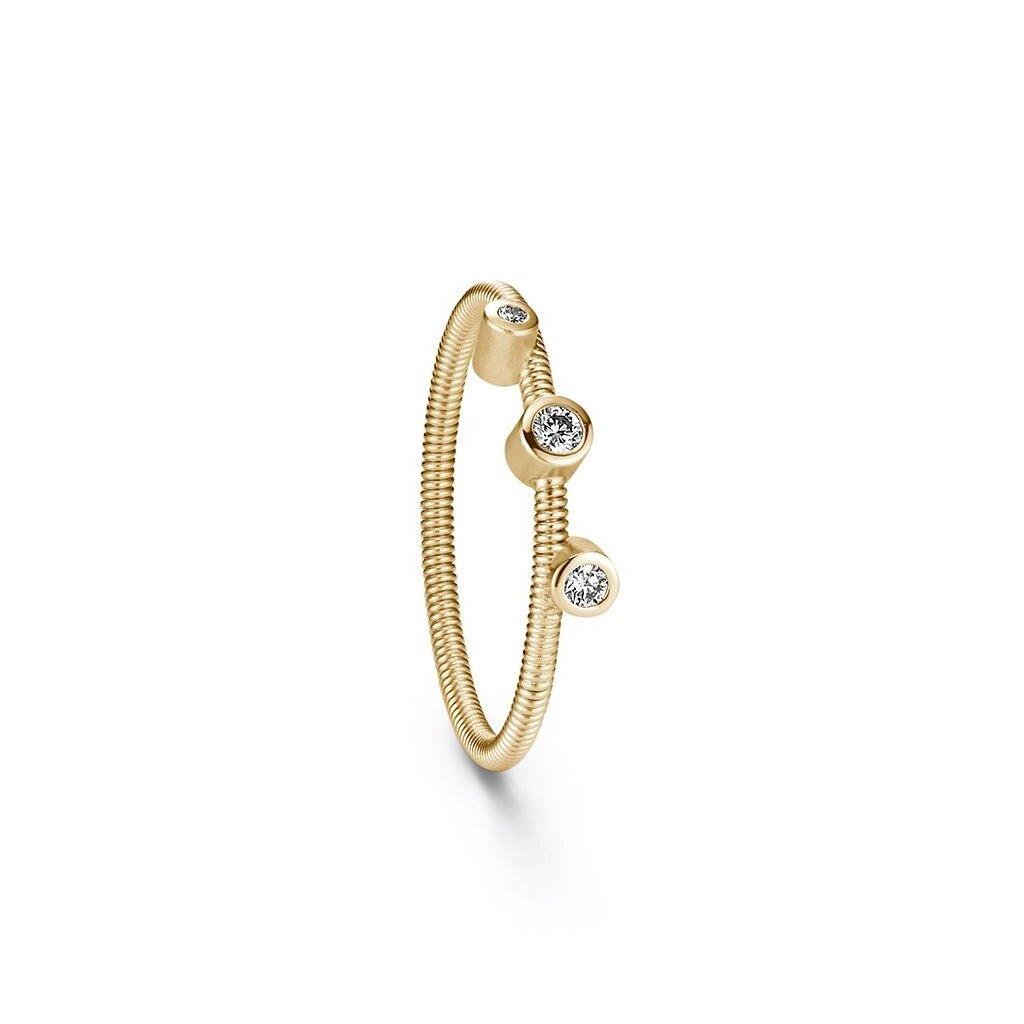 een 18 krt geelgouden ring Niessing model Artist met drie diamant stenen briljant geslepen totaal 0.08 crt VS TW