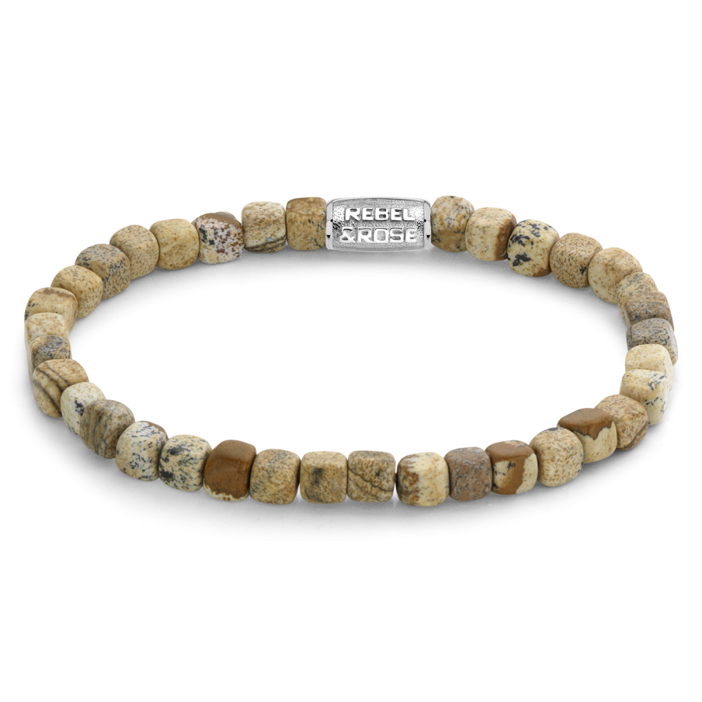 Deze armband is van het merk Rebel & Rose met bruin/beige Lithografiet