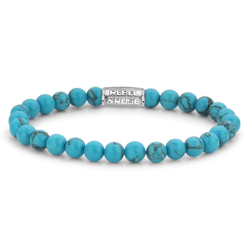 Edelstenen bead armband, handgemaakt van 6mm Turquoise met een zilverkleurige sluiting. Het Rebel & Rose sieraad is makkelijk te combineren met andere zilveren, leren of kralenarmbanden.