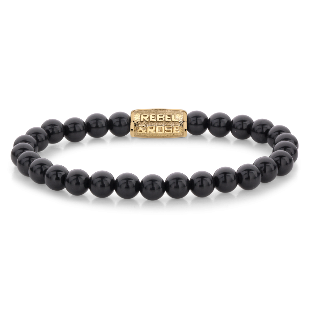 Dit prachtige Rebel & Rose armband heeft een uniseks ontwerp met zwarte fluwelen kralen en een Zwart Onyx edelsteen van 6mm. De perfecte manier om een stoere touch toe te voegen aan je outfit. Draag het alleen of combineer het met andere armbanden voor een trendy look. Het elastische bandje zorgt voor een comfortabele pasvorm.