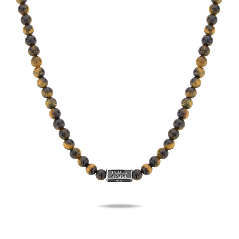 Deze collier is van het merk Rebel & Rose. Het is een herensieraad. De collier is bruin van kleur.