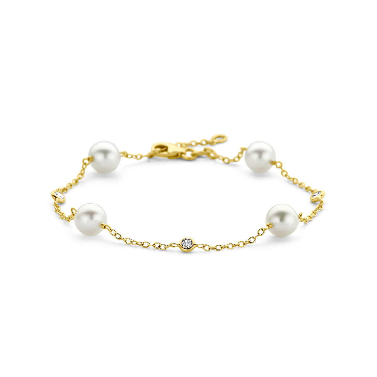 14k Geelgouden armband uitgevoerd met zoetwaterparels, zirkonia en een karabijn sluiting. De armband heeft draaglengte van 17 en 19cm. De schakelbreedte is 1.3mm.
