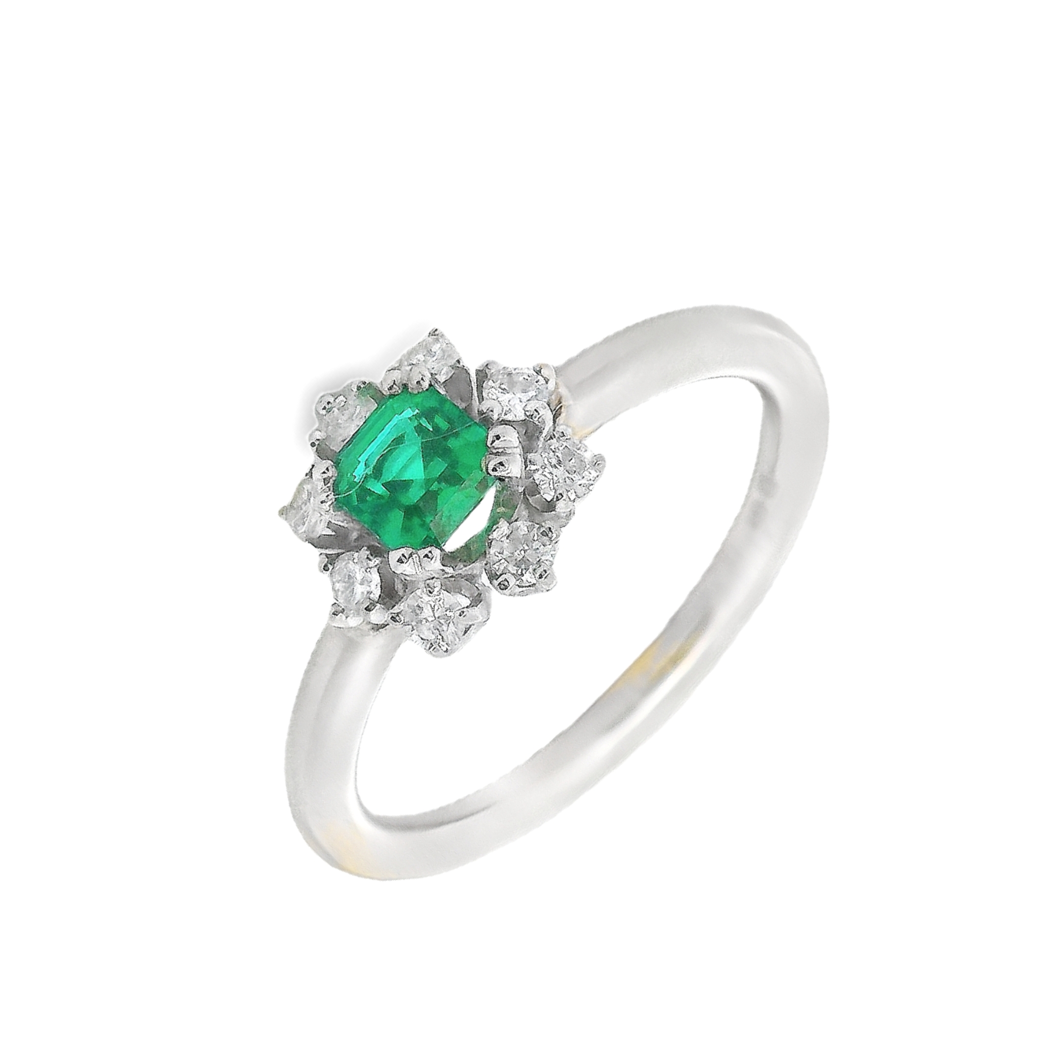Deze ring van Louis Bros is vervaardigd uit 14 karaat witgoud (5.84 gr.) en is gezet met 8 briljant geslepen diamanten met een totaalgewicht van 0.10ct en 1 smaragd 0.40ct. De ring heeft een diameter van 9. mm, minimale breedte van 2.5 mm.
Deze ring straalt pure elegantie uit, met een levendige smaragd als middelpunt, omringd door een fonkelende rand van diamanten. Het koele witgoud accentueert de rijke, groene kleur van de smaragd, terwijl de diamanten een extra laag van schittering en luxe toevoegen. Dit verfijnde ontwerp maakt de ring tot een opvallend en stijlvol sieraad, ideaal voor zowel bijzondere gelegenheden als dagelijks gebruik. Een tijdloos en prachtig stuk dat een waardevolle aanvulling is op elke sieradencollectie.
De ring is verkrijgbaar in meerdere afmetingen.