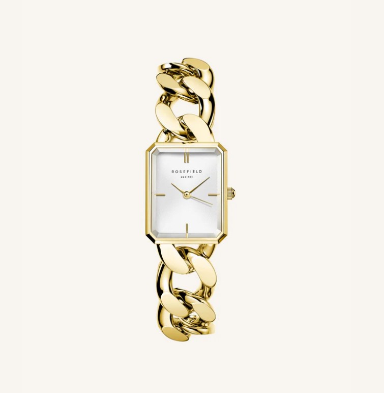 Ontdek Rosefield Studio: een collectie van uitgesproken items met een extra premium uitstraling. Het nieuwste RF Studio item is een twist op het klassieke Octagon horloge, maar dan in een kleiner XS formaat. De horlogeband, een luxe gepolijste platte kinketting, maakt van dit klokje bijna een sieraad. Je kunt het formaat van de ketting aanpassen om hem passend te maken en hem sluiten door de T-bar door de O-ring te vergrendelen.