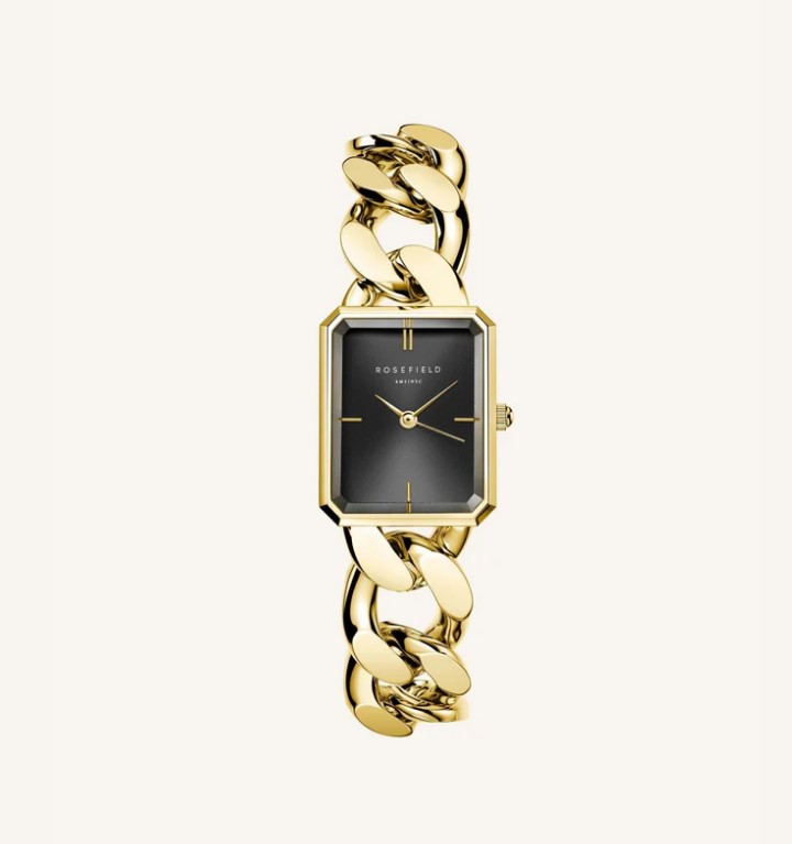 Ontdek Rosefield Studio: een collectie van uitgesproken items met een extra premium uitstraling. Het nieuwste RF Studio item is een twist op het klassieke Octagon horloge, maar dan in een kleiner XS formaat. De horlogeband, een luxe gepolijste platte kinketting, maakt van dit klokje bijna een sieraad. Je kunt het formaat van de ketting aanpassen om hem passend te maken en hem sluiten door de T-bar door de O-ring te vergrendelen.