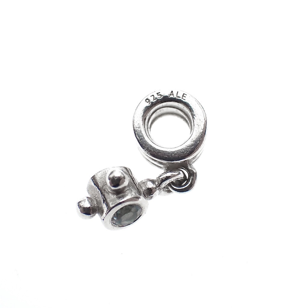 Abstract zilver bengelen met blauwe topaz
