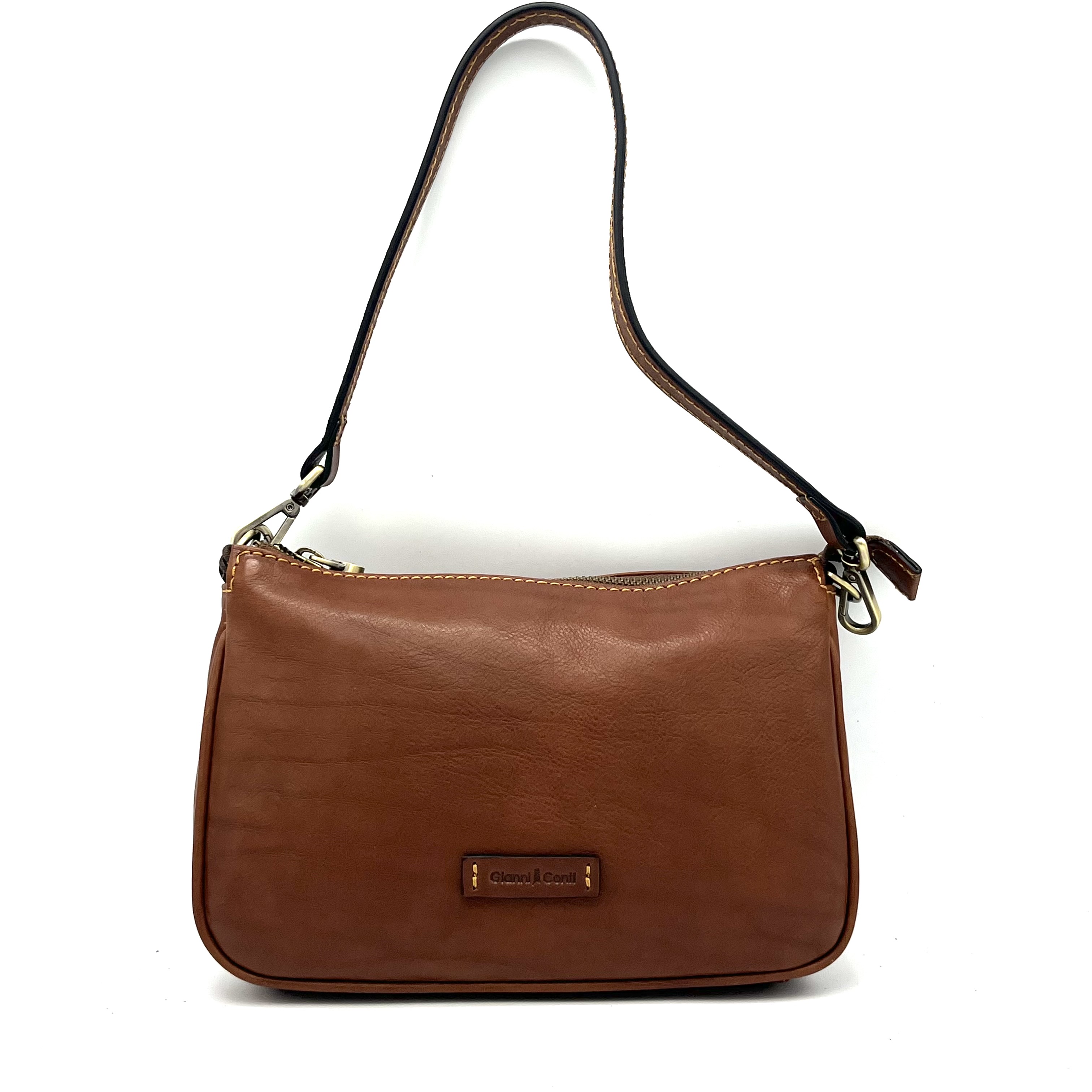 De Gianni Conti Maremma crossover/schoudertas in Cognac is gemaakt van hoogwaardig leer en heeft een verstelbare en afneembare schouderband. De tas heeft diverse vakken en is erg praktisch in gebruik. Draag hem crossbody voor een trendy look of over de schouder voor meer comfort. Een veelzijdige en stijlvolle toevoeging aan je outfit!

Eigenschappen:
afneembare korte band
Afneembare/v4rstelbare lange band
Top rits
Binnen ritsvak
Steekvak voor telefoon

Afmetingen:
Hoogte 16cm x breed 25cm x diep 5cm
