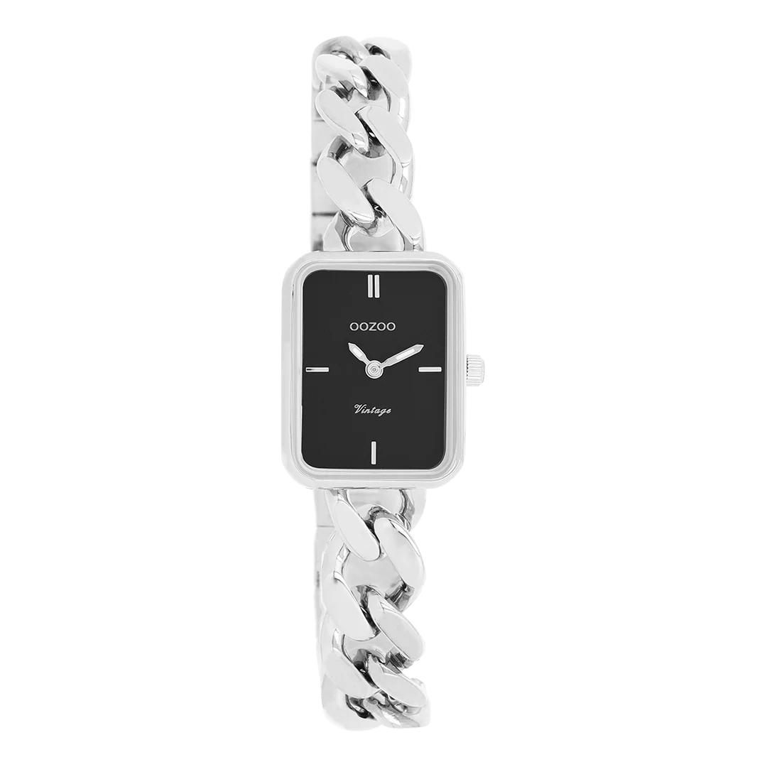 De klassieke look blijft centraal staan in deze trendy serie en daarom is dit OOZOO vintage rechthoekig design met een speelse knipoog dé musthave van het seizoen! Dit dames horloge is de perfecte combinatie van comfort en fashion met zijn 20x26 mm zilverkleurige metalen horlogekast en zwarte wijzerplaat. De wijzerplaat heeft zilverkleurige strepen tijdsaanduidingen en bijpassende kleurige wijzers. De zilverkleurige grove schakelarmband maakt dit horloge tot een trendy accessoire dat je elke dag kunt dragen. Dit horloge voegt de sprankeling toe aan je outfit. Het mineraalglas ligt in een 6,9 mm dunne metalen horlogekast met IP-plating. De C20361 heeft een stainless steel achterplaat en is nikkel-safe. Dit horloge heeft een 2ATM Japans uurwerk en wordt gedekt door een garantie van 2 jaar 