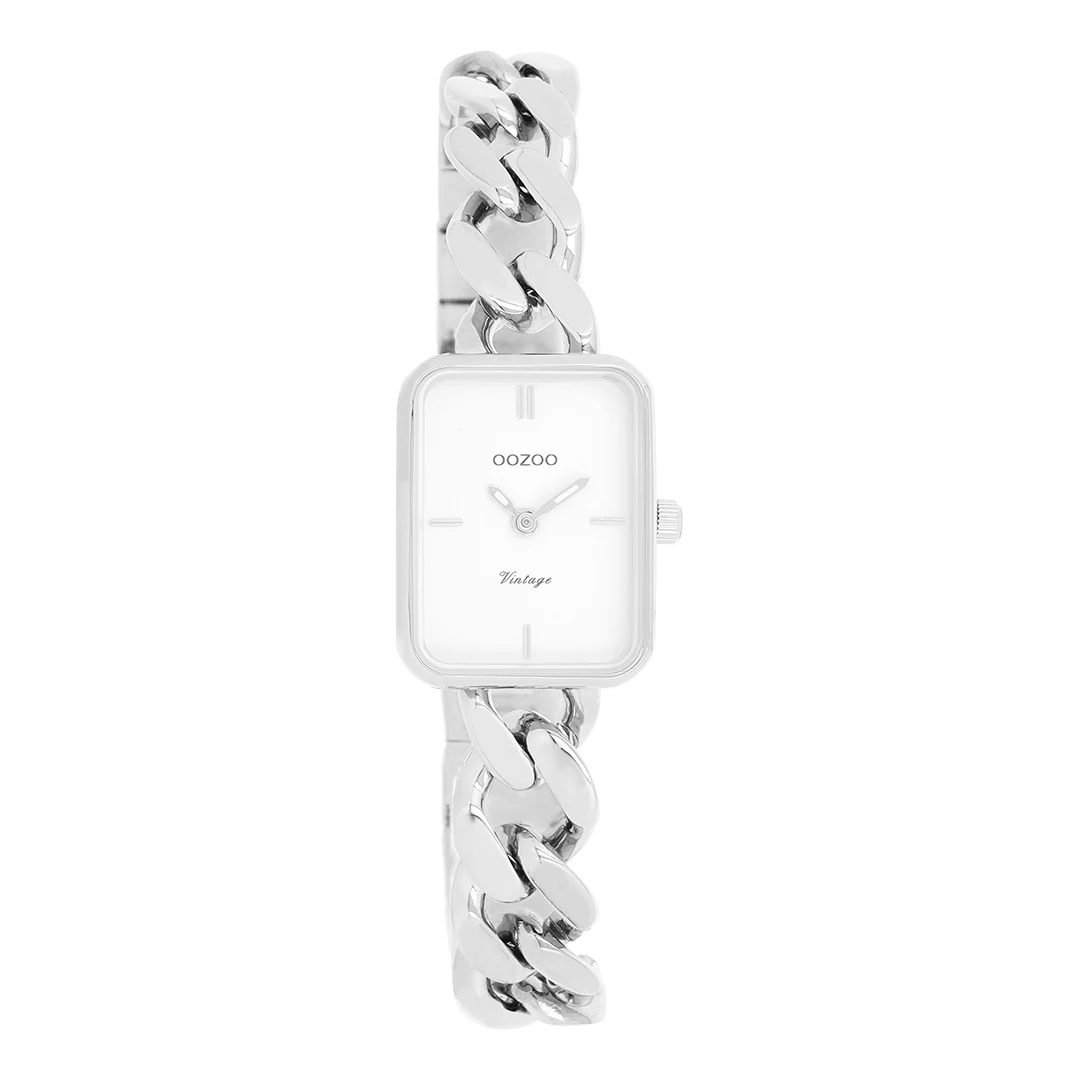 De klassieke look blijft centraal staan in deze trendy serie en daarom is dit OOZOO vintage rechthoekig design met een speelse knipoog dé musthave van het seizoen! Dit dames horloge is de perfecte combinatie van comfort en fashion met zijn 20x26 mm zilverkleurige metalen horlogekast en witte wijzerplaat. De wijzerplaat heeft zilverkleurige strepen tijdsaanduidingen en bijpassende kleurige wijzers. De zilverkleurige grove schakelarmband maakt dit horloge tot een trendy accessoire dat je elke dag kunt dragen. Dit horloge voegt de sprankeling toe aan je outfit. Het mineraalglas ligt in een 6,9 mm dunne metalen horlogekast met IP-plating. De C20360 heeft een stainless steel achterplaat en is nikkel-safe. Dit horloge heeft een 2ATM Japans uurwerk en wordt gedekt door een garantie van 2 jaar