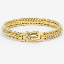 Deze armband is zilver verguld lengte D, dus het goud laagje kan er af slijten, 1 jaar garantie 