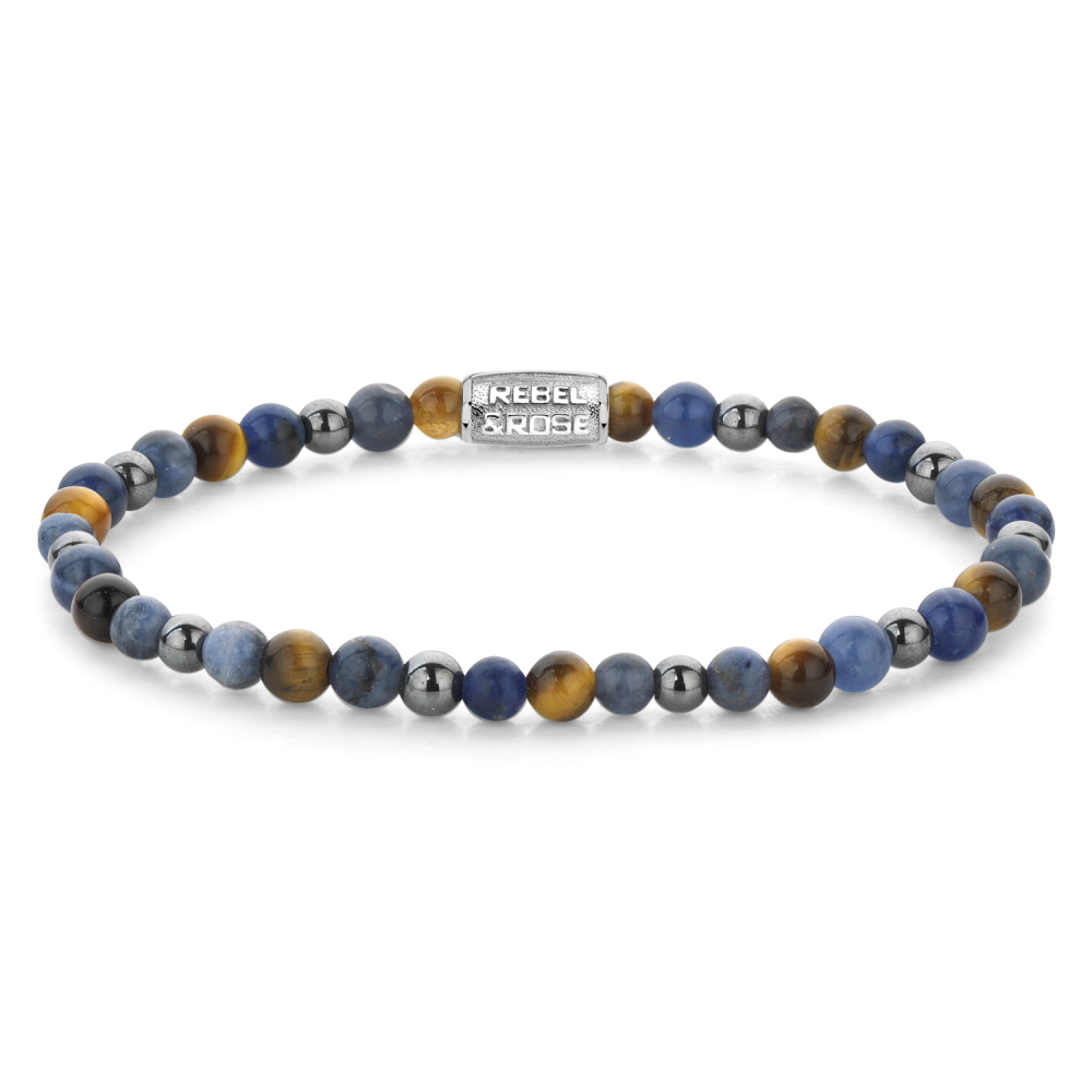 Edelstenen bead armband, handgemaakt van 4mm Sodaliet, gele Tijgeroog, blauwe Tijgeroog en grijze Hematiet stenen. De sluiting is van stainless steel. Het Rebel & Rose sieraad is makkelijk te combineren met andere zilveren, leren of kralenarmbanden.