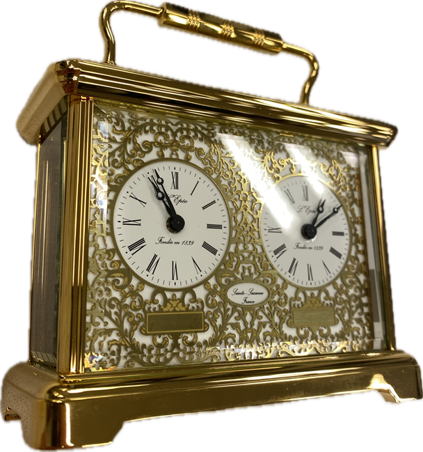 Carriage Clock van het merk L'Epee. Zware vergulde messing behuizing met een traditioneel mechanisch Carriage Clock uurwerk met echappement.