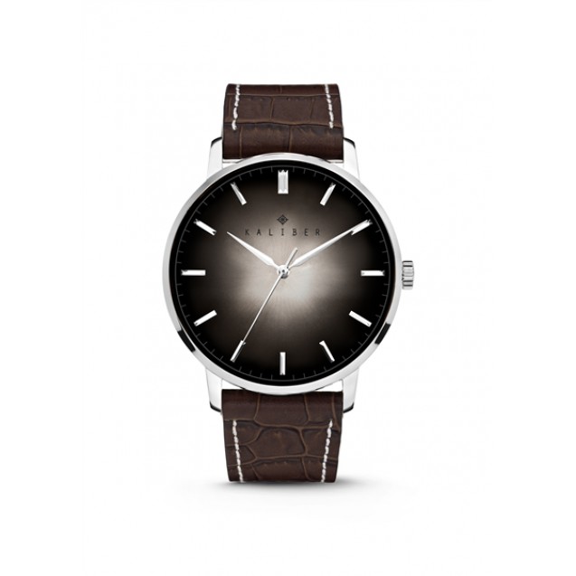 Liefhebber van horloges? Ga voor de Kaliber Watch collection. De design valt meteen op de zonnestraalvormig wijzerplaat (sun ray dial) en is mooi afgewerkt met 3D reliëf accenten. De horlogekast heeft een diameter van 40 mm en een gesp sluiting, het is een slanke stalen kast met een chic croco print leren band. Het horloge heeft 5ATM waterdichtheid. De modellen zijn verkrijgbaar in 6 verschillende kleurvarianten.