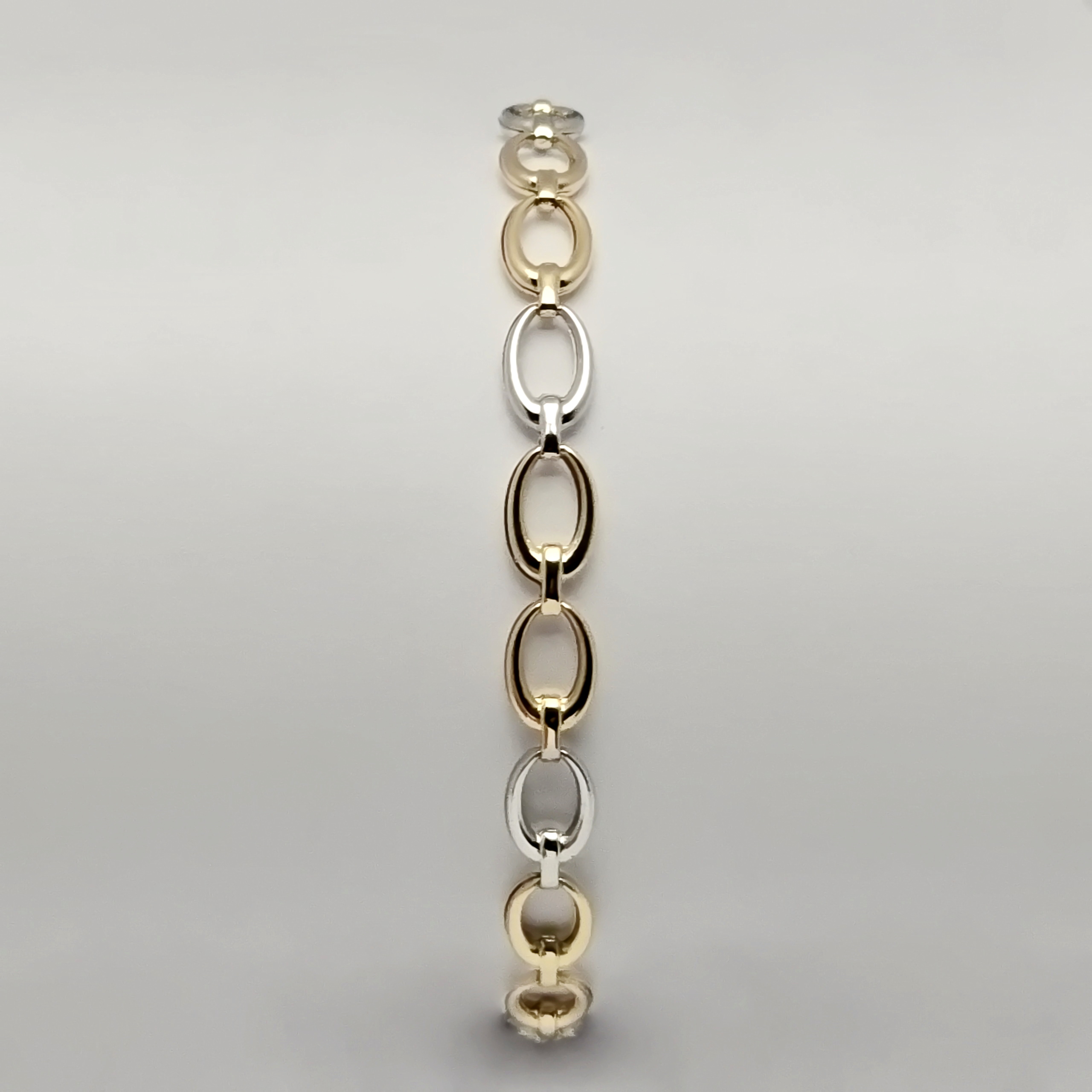 Gouden bicolor armband van 19 cm.