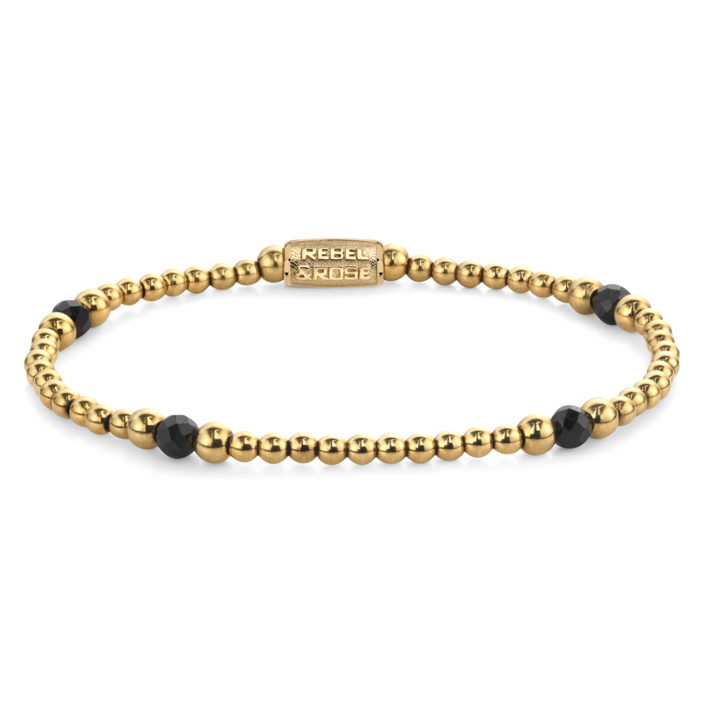Edelstenen bead armband, handgemaakt van 4mm Black Spinel gefaceteerde kralen, afgewisseld met 3mm en 4mm 18 karaat goud ion-plated edelstalen stenen. De sluiting is gemaakt van 18 karaat goud ion-plated edelstalen. Het Rebel & Rose sieraad is makkelijk te combineren met onze andere kralenarmbanden.