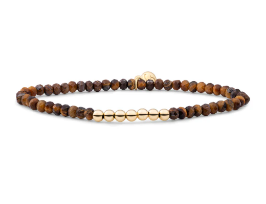 Deze Reverse Universe armband met 4mm cilindervormig gefacetteerde Tiger Eye edelsteenkralen en 925 sterling zilveren of goudkleurige kralen is een hele goede toevoeging aan jouw armbandencollectie, daarnaast vormt de Reverse Universe armband de perfecte basis voor jouw armbandenstack! Alle Tiger Eye edelstenen zijn met de hand vervaardigd en daardoor is elk kraaltje én elke armband uniek, hoe leuk is dat? Combineer hem met bijpassende edelsteen sieraden uit de Tiger Eye Collectie of creëer een mooie stack met onze andere kralenarmbanden!