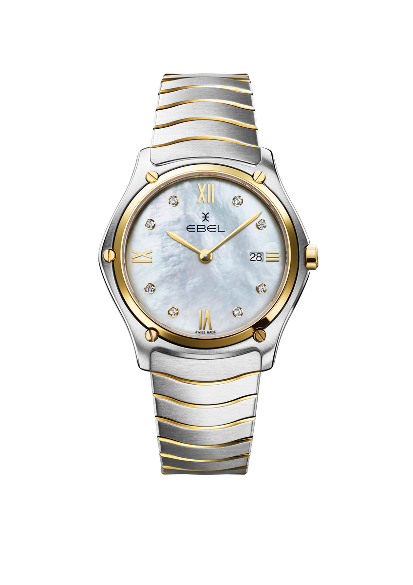 Sport Classic Parelmoer heeft een klassiek ontwerp met een parelmoer wijzerplaat en roestvrijstalen band. Het horloge heeft functies zoals waterbestendigheid en stopwatch. Draag dit horloge voor een sportieve en chique uitstraling bij elke gelegenheid. Combineer het met zowel sportieve kleding als formele outfits voor een veelzijdige look. 

