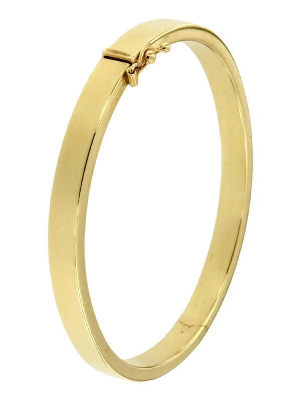 Deze bangle van Louis Bros is vervaardigd uit 14 karaat geelgoud (23 gr) . De armband heeft een breedte van 7 mm en een dikte van 2.5 mm. 
Deze tijdloze bangle is een elegant en veelzijdig sieraad dat nooit uit de mode raakt. Met zijn minimalistische ontwerp en strakke lijnen straalt een gouden bangle een subtiele luxe uit. Het warme, glanzende goud past bij elke outfit en gelegenheid, van casual tot formeel. Deze bangle is vaak een symbool van verfijnde smaak en blijvende schoonheid. Bovendien kan een gouden bangle gemakkelijk worden gestapeld met andere armbanden voor een moderne en persoonlijke touch. Het is een investering in stijl, die generaties lang gekoesterd kan worden.