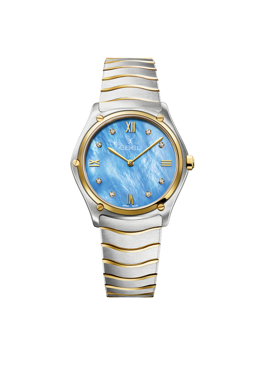 ebel sport classic heeft een blauwe parelmoer wijzerplaat met briljanten indexen (0,052crt.) en goudkleurige wijzers. De heldere kleur van de wijzerplaat zorgt voor een betoverende uitstraling. De horlogeband is gemaakt van edelstaal gecombineerd met 18 karaat geelgoud. Ook in de horlogekast en schroeven zit 18 karaat geelgoud verwerkt. De kast heeft een diameter van 33 millimeter. Het model is bovendien tot 50 meter waterdicht.