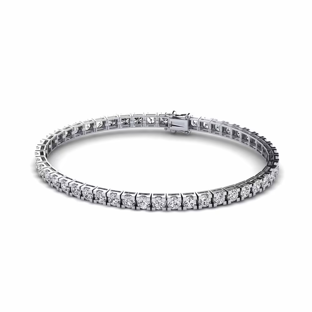 Deze armband van Louis Bros is vervaardigd uit 14 karaat witgoud (11.66gr).
Deze tennisarmband met zirkonia straalt moderne elegantie en verfijning uit. De heldere zirkonia’s, die in een strakke lijn zijn gezet, schitteren prachtig tegen de koele glans van het witgoud. Deze tijdloze armband biedt een stijlvolle balans tussen eenvoud en luxe, perfect voor zowel dagelijkse verfijning als speciale gelegenheden. De combinatie van sprankelende stenen en het moderne witgoud maakt het een veelzijdig sieraad dat een vleugje glamour toevoegt aan elke outfit.