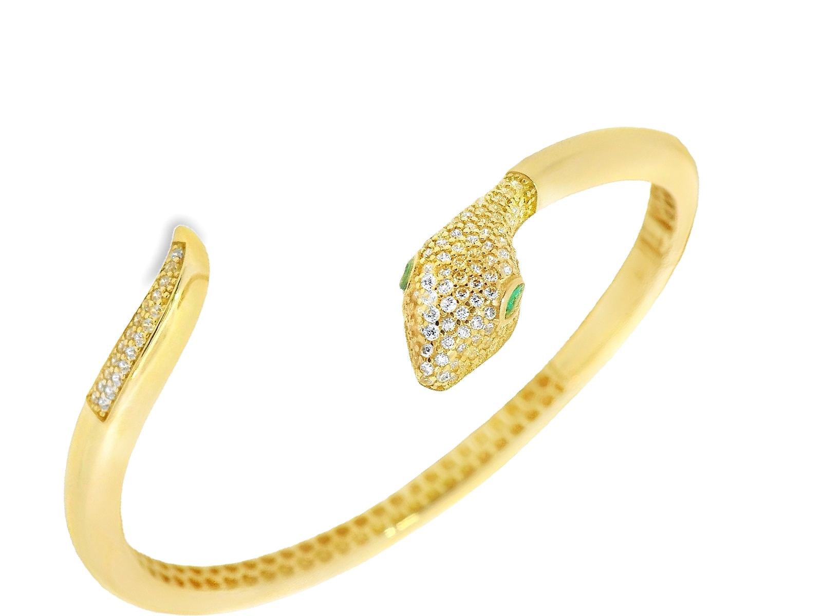 Deze armband van Louis Bros is vervaardigd uit 14 karaat geelgoud (13.20 gr.). De armband heeft een dikte van 5 mm en een breedte van 9 mm.
Deze armband is een echte blikvanger. Het elegante ontwerp, versierd met fonkelende zirkonia's, geeft de armband een luxe uitstraling. Het slangenmotief symboliseert kracht en mysterie, terwijl de geelgouden afwerking een tijdloze charme toevoegt. Perfect voor zowel dagelijkse draagbaarheid als bijzondere gelegenheden, voegt deze armband een vleugje verfijning en glamour toe aan elke look. Met zijn hoogwaardige materialen en verfijnde afwerking is deze armband een prachtige toevoeging aan elke sieradencollectie.