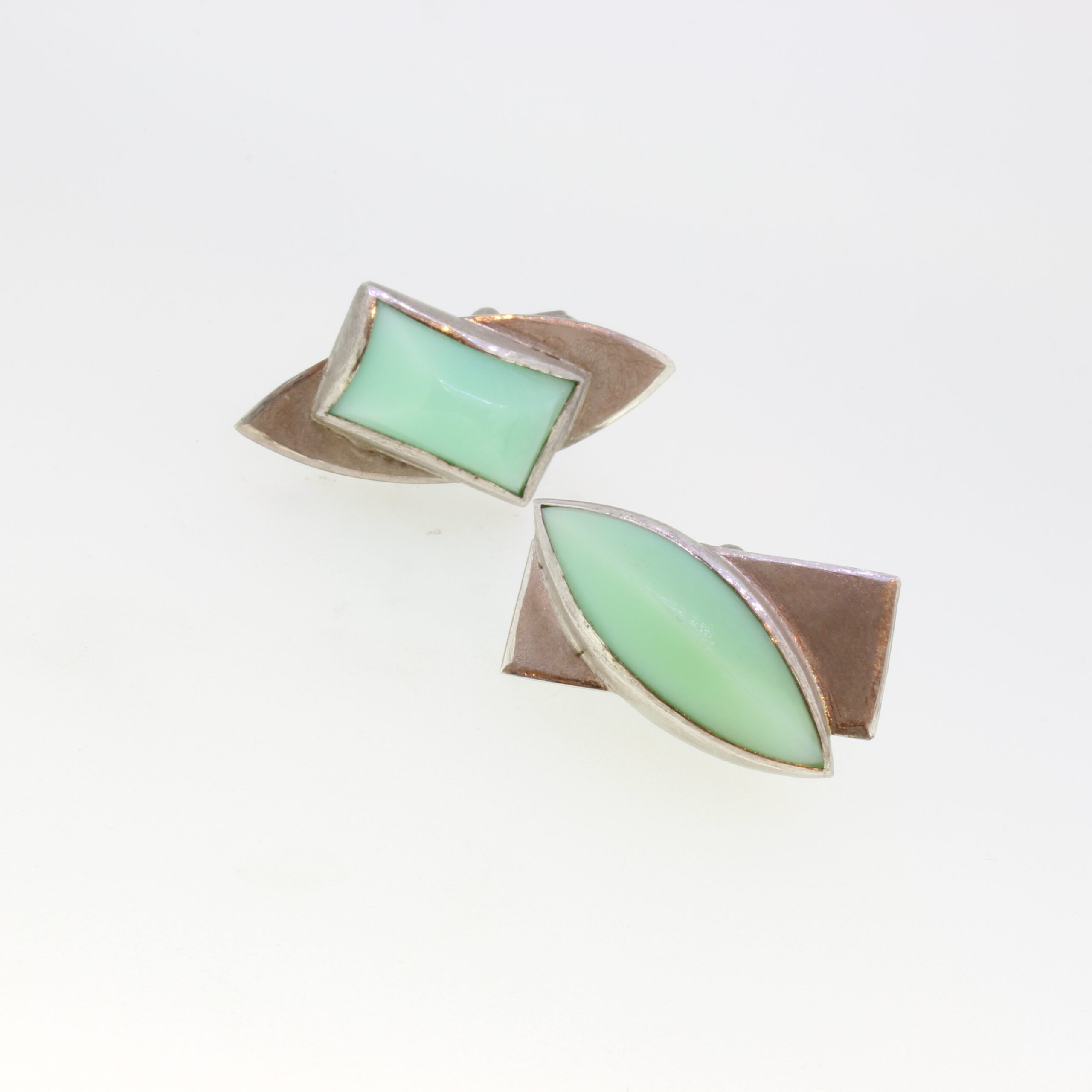 Manschettenkn&ouml;pfe in Silber 925 
2 Chrysoprase
UNIKAT

Gefertigt im Atelier Kissner
Design: Carsten Kissner