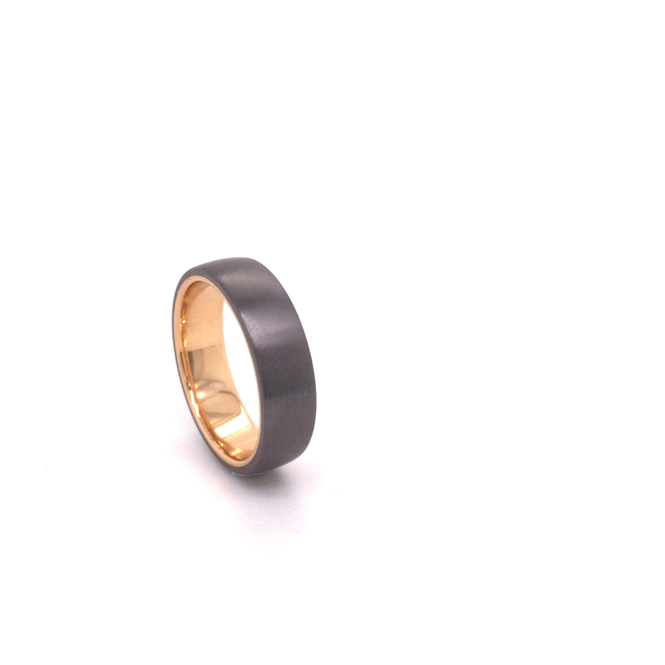 Ring / Trauring Axial gefertigt aus Gold 750 Rosé und Tantal


Größe #60.