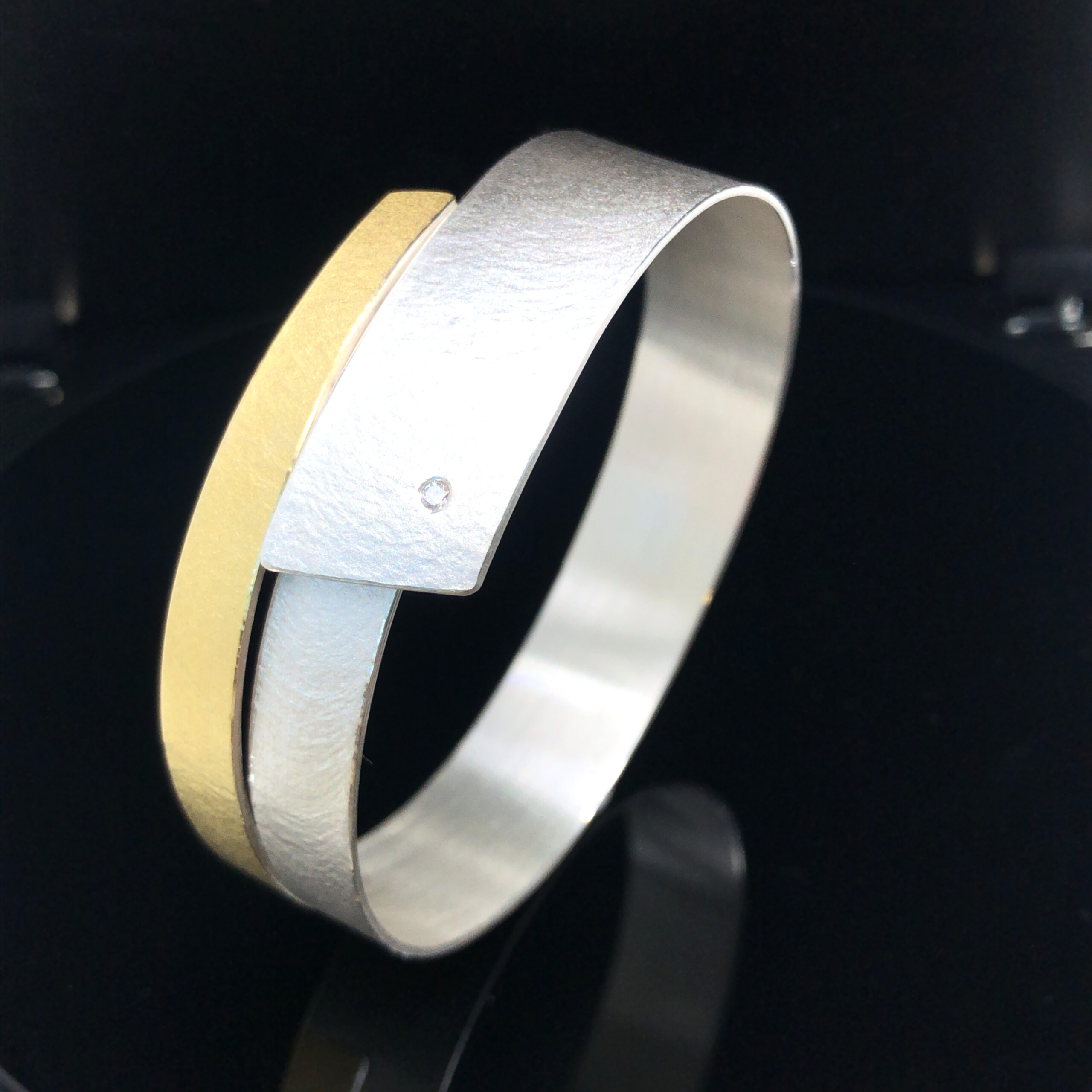 Armreif in Silber 925/ Gold 900 mit einem Brillanten 0,03ct