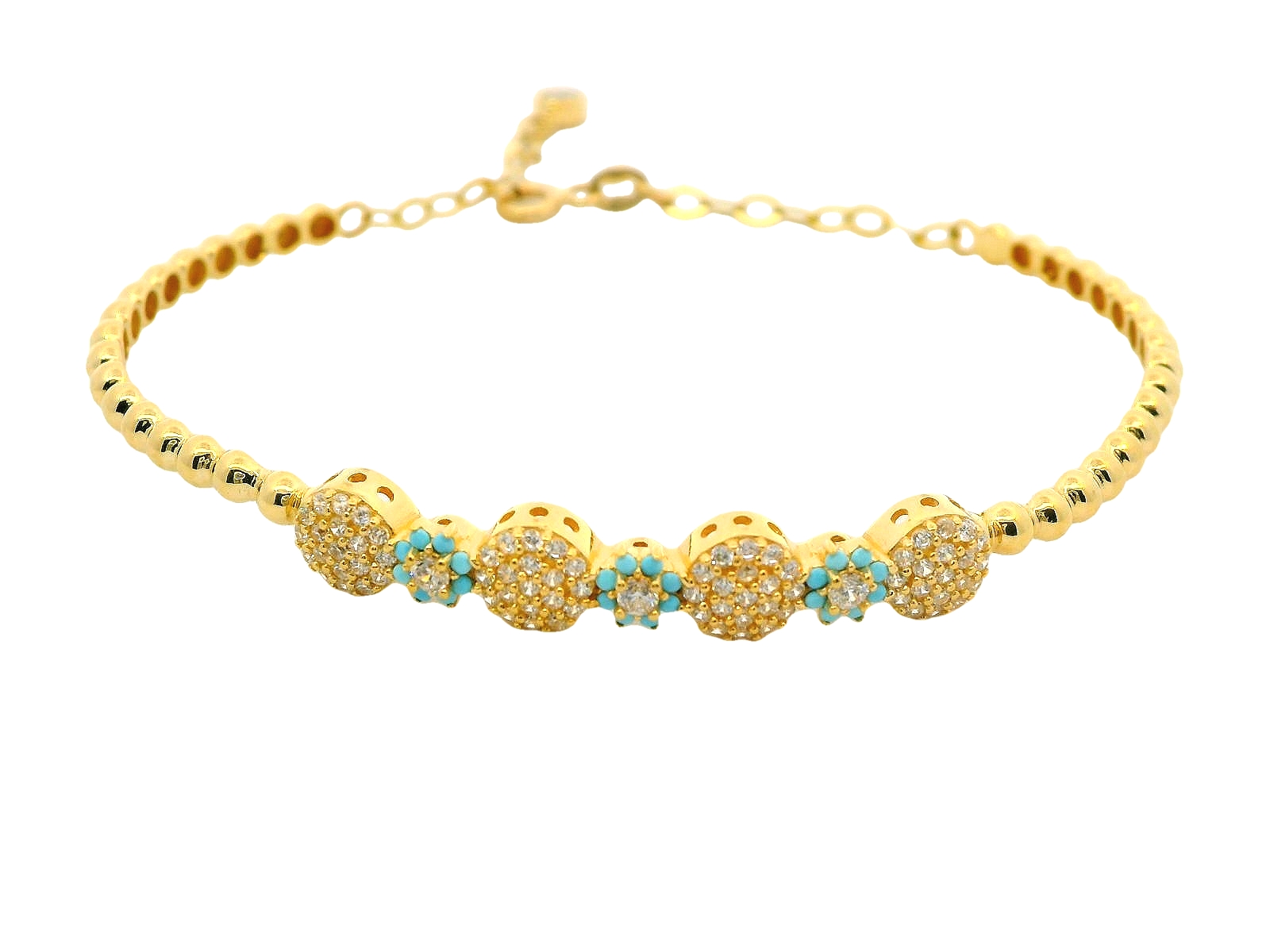 Deze armband van Louis Bros is vervaardigd uit 14 karaat geelgoud (6.97 gr.). 
Deze armband met zirkonia en een turquoise steen is een schitterend en levendig sieraad. Het warme geelgoud vormt een perfecte achtergrond voor de sprankelende zirkonia's, die zorgen voor een stralend effect. De turquoise steen voegt een frisse, opvallende kleur toe, die symbool staat voor kalmte en bescherming. Deze combinatie van edelstenen en goud geeft de armband een elegante, maar ook exotische uitstraling, waardoor het een prachtig accessoire is voor zowel dagelijks gebruik als speciale gelegenheden.