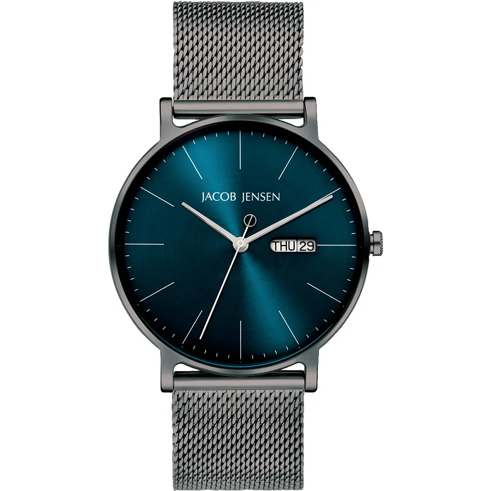 De JACOB JENSEN HORLOGE 167 biedt een stijlvol ontwerp met een rond titanium kast en saffierglas. Met een analoge kwartsbeweging en een blauwe wijzerplaat met strepen, beschikt het horloge over een datumaanduiding. Het zilverkleurige Milanese bandje van roestvrij staal maakt het compleet. Draag het dagelijks voor een elegante uitstraling en comfort, dankzij zijn anti-allergene eigenschappen.