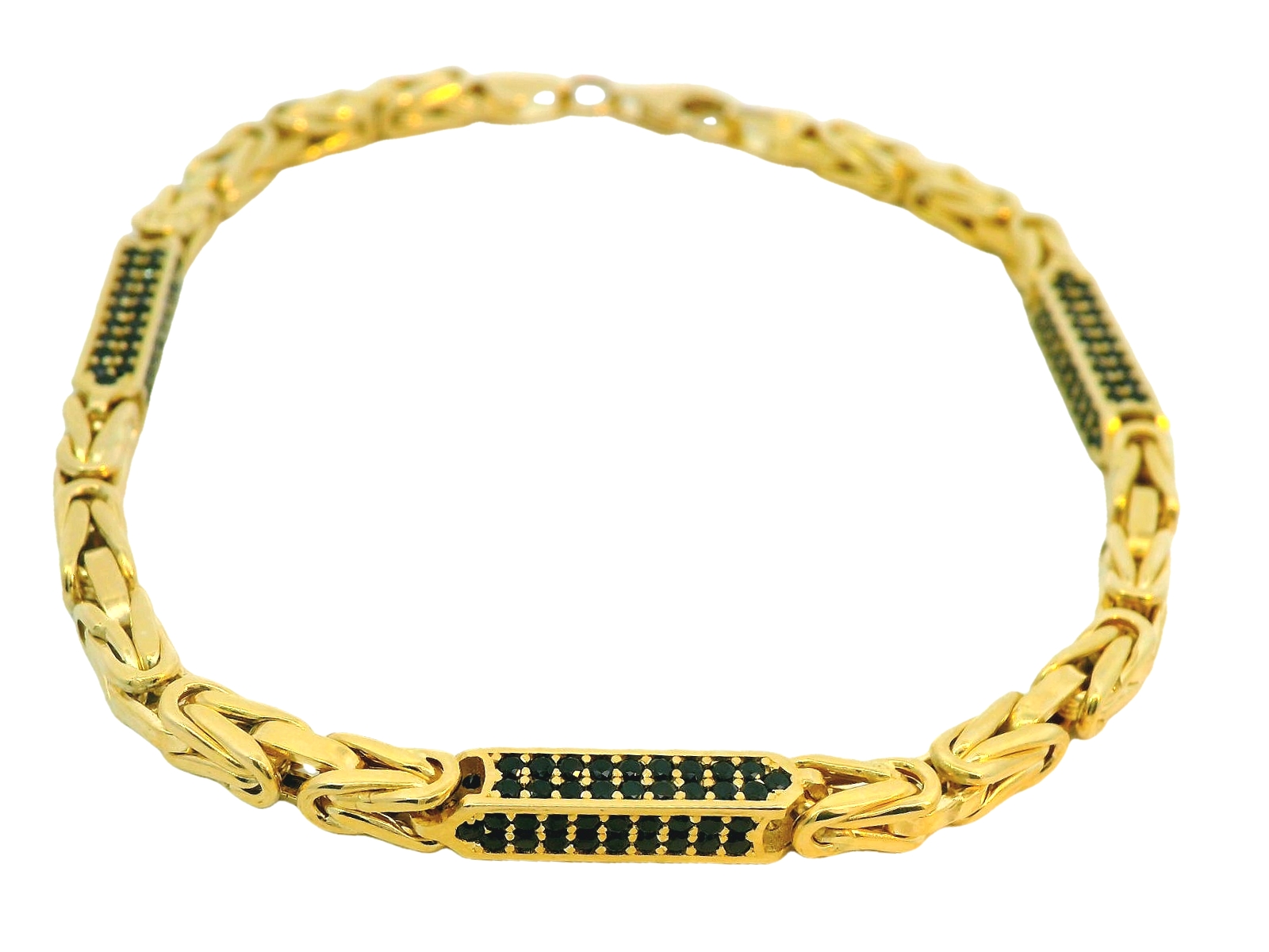 Deze armband van Louis Bros is vervaardigd uit 14k geelgoud (11.18 gr).
Deze koningsschakel armband van geelgoud straalt klassieke elegantie en vakmanschap uit. Deze armband is vervaardigd uit stevig 14-karaats geelgoud en bestaat uit de iconische, gedetailleerde koningsschakelstructuur, die bekend staat om zijn kracht en verfijnde ontwerp. De zware zirkonia’s, strategisch geplaatst in de schakels, voegen een vleugje schittering toe, waardoor de armband een luxueuze uitstraling krijgt. Dit sieraad is perfect voor mensen die houden van een tijdloos design met een moderne, glanzende twist.

