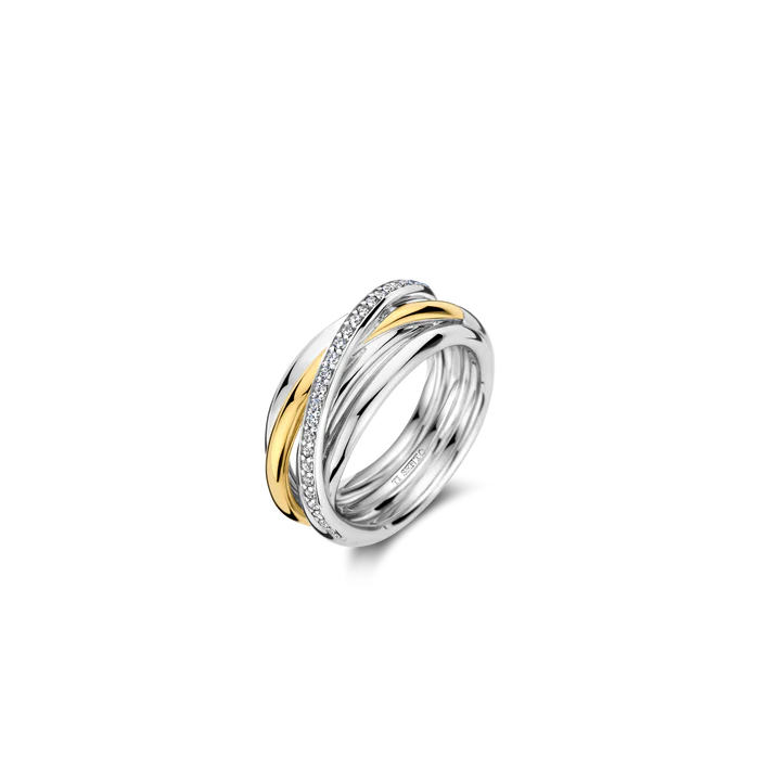 Deze prachtige Ti Sento ring is voorzien van bicolore zirkonia stenen en heeft maat 56. De ring is perfect om te dragen bij elke gelegenheid, of het nu casual of formeel is. De combinatie van de zilveren en gouden accenten maakt het een veelzijdig sieraad dat een vleugje glamour toevoegt aan elke outfit. Draag deze ring aan je vinger en straal met elegantie en stijl!