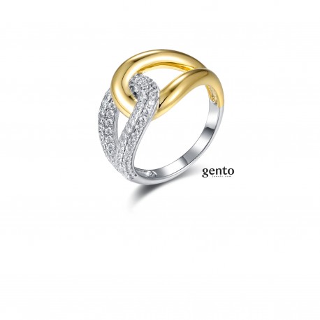 Deze prachtige Gento ring MB16 is gemaakt van gerhodineerd zilver, deels verguld, en afgewerkt met  zirconiumstenen.
De rhodiumlaag zorgt voor extra bescherming tegen oxidatie en geeft een mooie glans.
Deze ring kan gecombineerd worden met de bijpassende armband MB15, ketting MB13 en oorbellen MB14