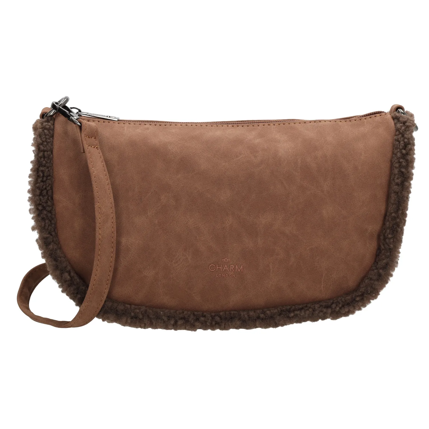 Maak kennis met de perfecte herfstaccessoire: de Charm London schoudertas! Deze schoudertas is niet alleen super stijlvol, maar ook helemaal klaar voor het seizoen dankzij de schattige teddystof randjes. Het hoofdvak is ruim genoeg voor al je essentials en sluit veilig af met een rits. Aan de achterkant van de tas vind je nog een extra ritsvakje, ideaal voor kleinere spullen die je snel bij de hand wilt hebben. De schouderband is verstelbaar en afneembaar, zodat je de tas kunt dragen zoals jij dat wilt. 
