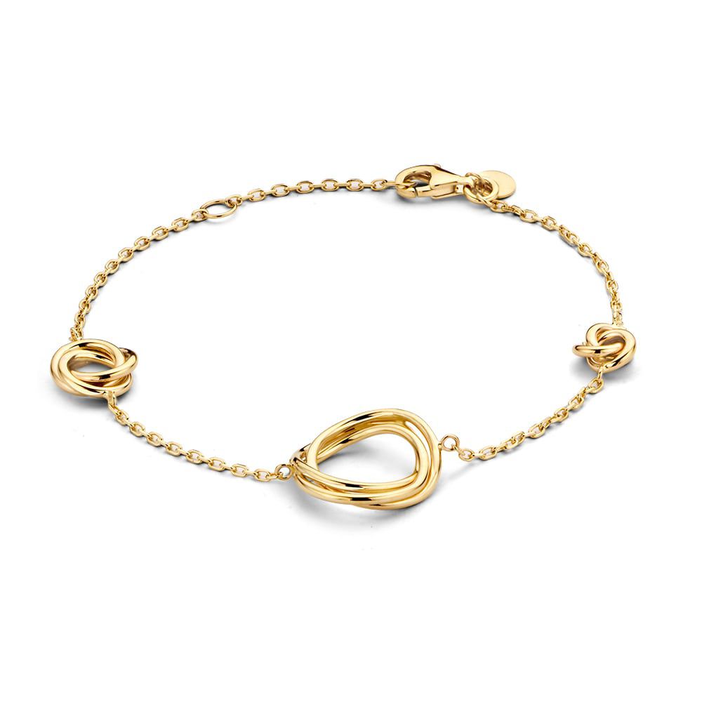 Gouden armband met drie elementjes.