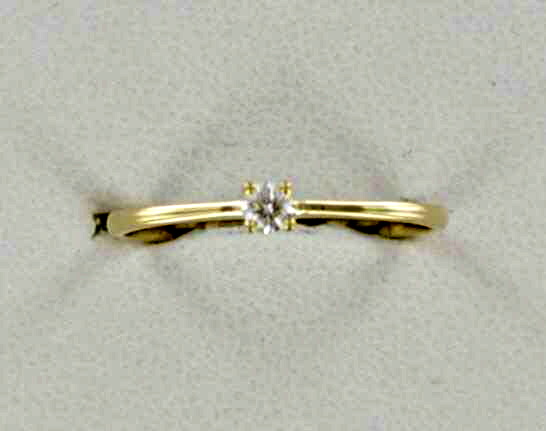 gouden solitair ring met 0.07 ct. briljant in maat 52.