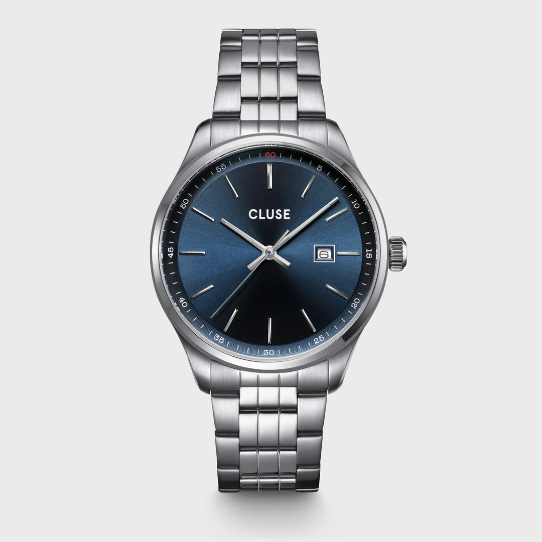 Deze Cluse horloge heeft een stoere uitstraling dankzij de stalen band en de diepblauwe wijzerplaat. De minimalistische vormgeving zorgt voor een tijdloze look. Het horloge is perfect voor zowel casual als formele gelegenheden. Draag het horloge om je pols als subtiele toevoeging aan elke outfit. Een must-have accessoire voor elke moderne man of vrouw. Bestel nu jouw Cluse horloge op onze webshop!