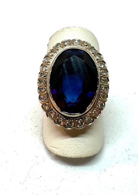 14 krt gouden ring met blauwe saffier en diamant 