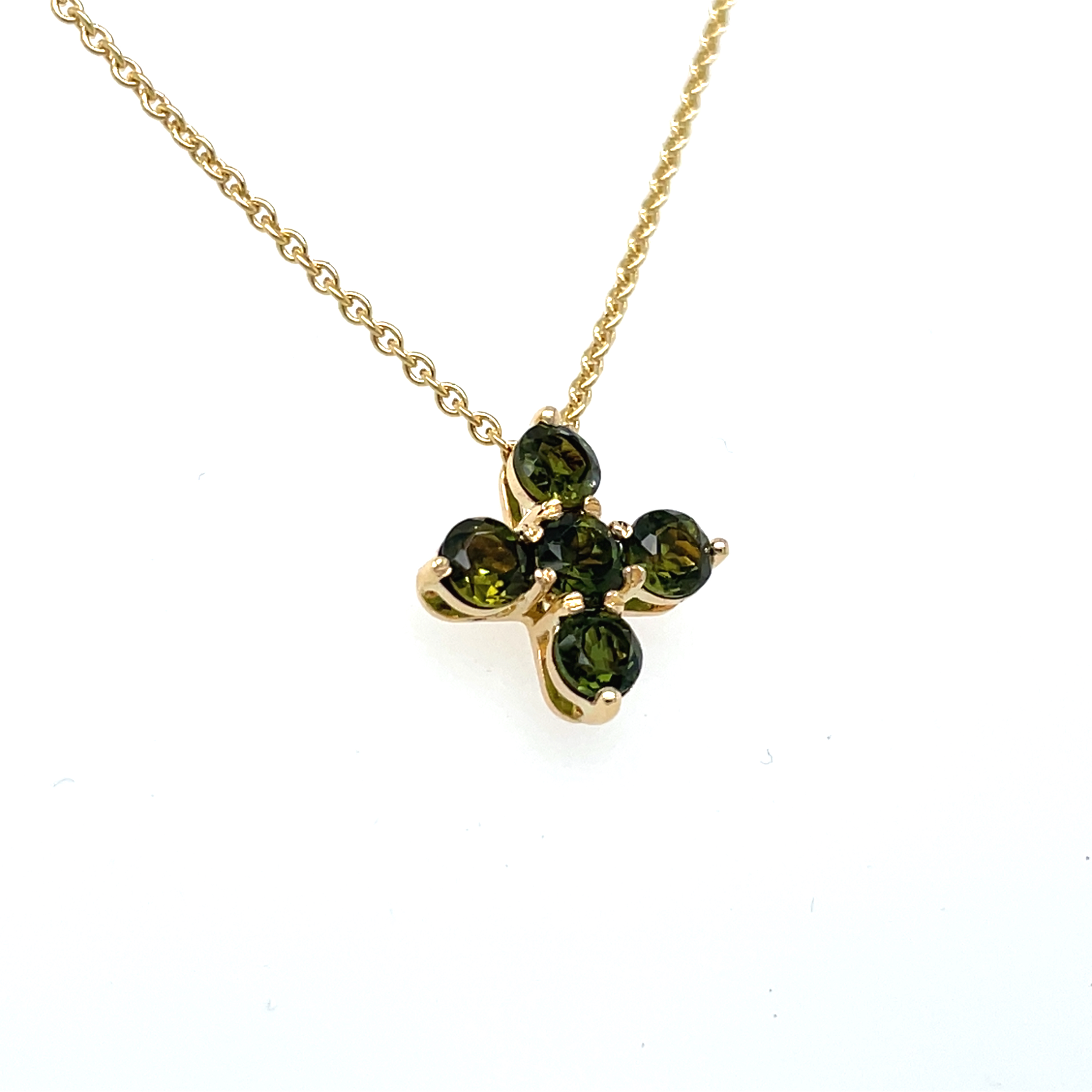 R&C Romance collier Cross bezet met 5x een groene toermalijn 
in 18 Krt Goud 