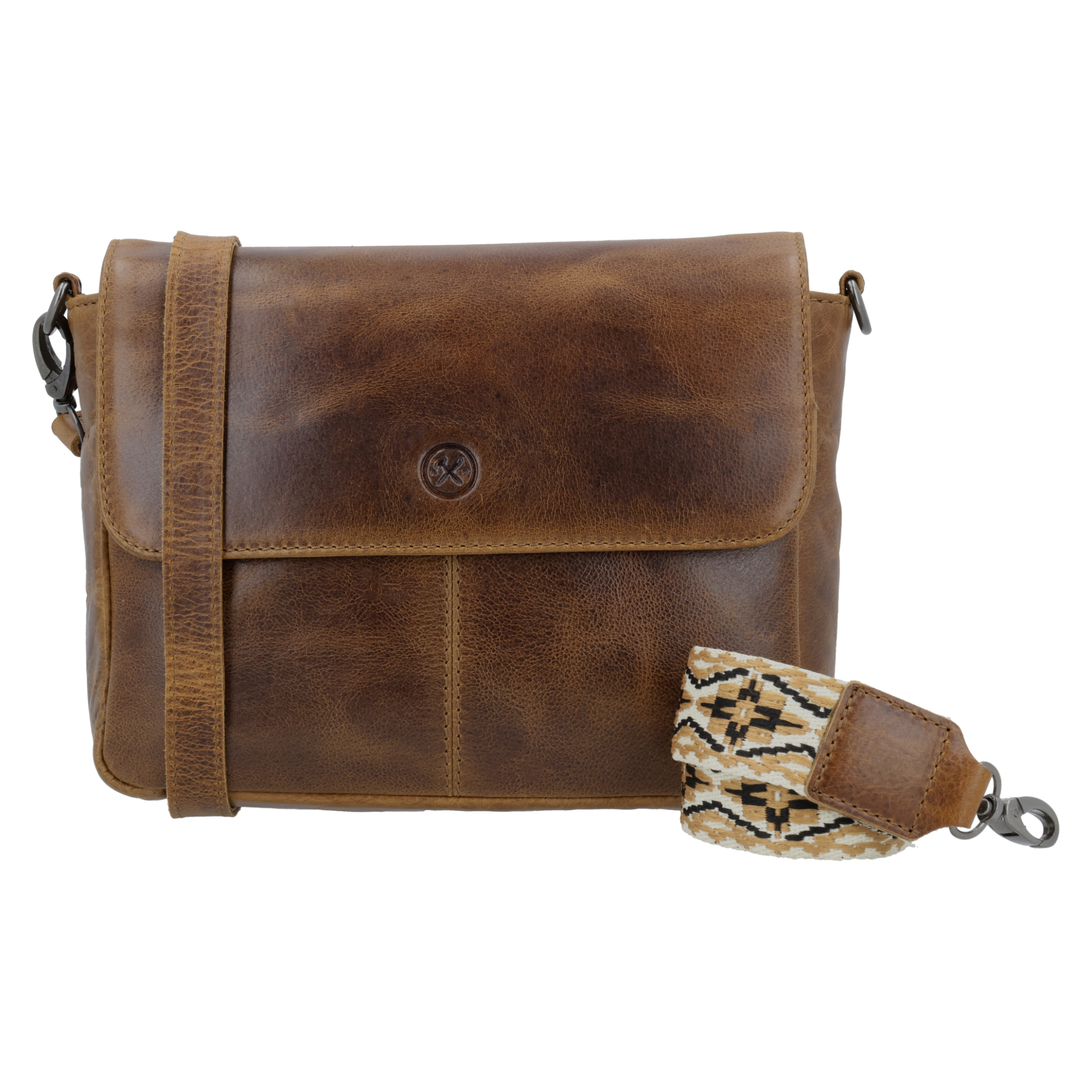Deze Hide & Stitches Next Navajo schoudertas 006 Bruin heeft een uniek design met handgestikte details en een stijlvolle bruine kleur. De tas heeft een ruim hoofdvak en een handige ritssluiting. Draag hem crossbody of over één schouder voor een trendy look. De perfecte accessoire voor elke gelegenheid!

Deze mooie schoudertas is gemaakt van hoogwaardig materiaal en afgewerkt met prachtige details. De tas heeft een verstelbare schouderband voor extra draagcomfort. Met deze tas maak je zeker een fashion statement!