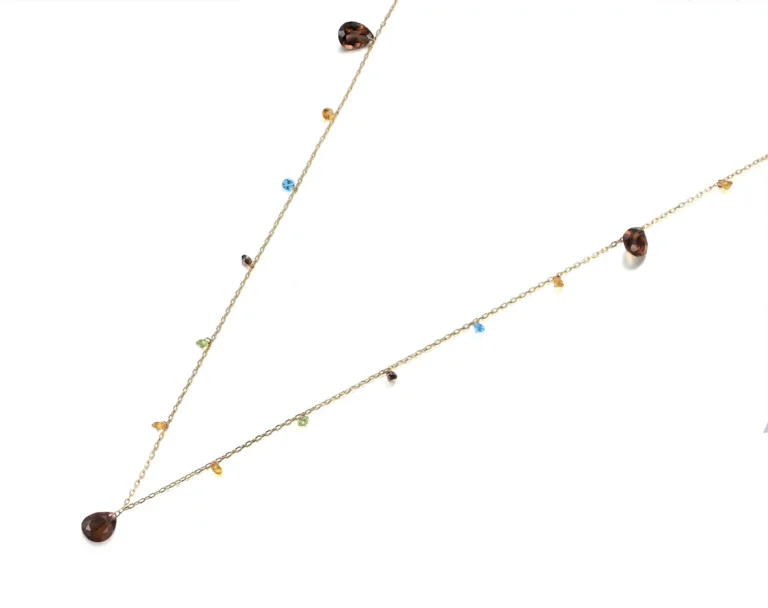 een 14 Krt geegouden collier met  29 kleurstenen totaal 0.04 crt. 
80 cm lengte