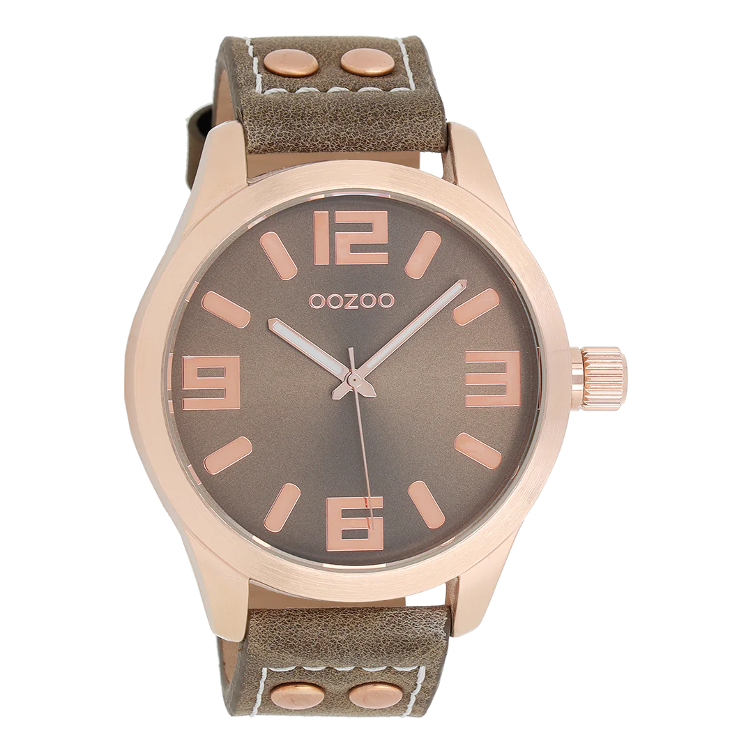 Rose gold coloured watch with taupe leather strap