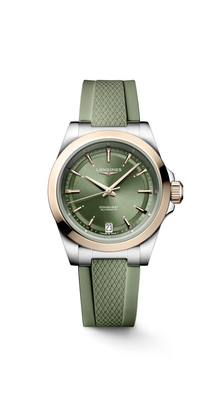 Longines conquest met een roestvrij stalen kast en 18-karaats roségouden cap en groene wijzerplaat en groen band.