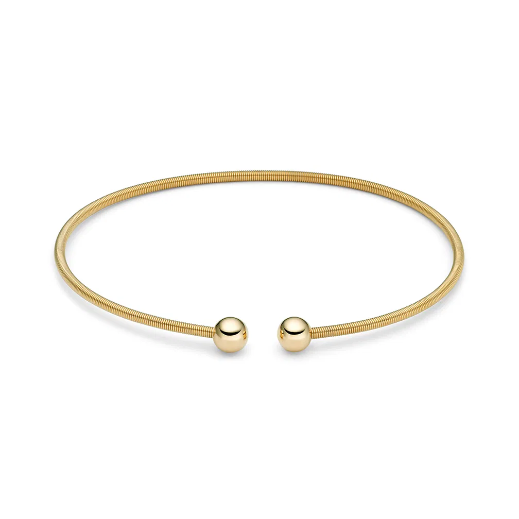 Een 18 krt geelgouden Niessing Colette C Space armband 
