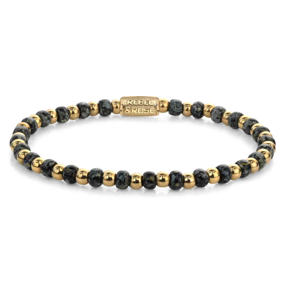 Bead armband, handgemaakt van 4mm kralen van glas (Glass Rocks), en 4mm verguld edelstalen beads. De sluiting is van verguld edelstaal. Onze ‘Rocks’ staan bekend om hun superieure kwaliteit, uniformiteit in afmetingen en bijzondere kleurschakeringen. Omdat de kleuren in het glas zijn gemengd, blijven ze extra lang mooi. De asymmetrisch geplaatste rijgopening in de kralen, zorgt voor een speels en gevarieerd en effect op de pols.

Modelnaam	Mix Glass Rocks Black Leopard  - 4mm
Modelnr.	RR-40159-G-M
Collectie	Bracelets Beads
Type sieraad	Armband
Kleur	Groen, Goudkleurig
Sluiting	Stainless Steel
Materiaal	Edelstenen
Steensoort	Glas Rocailles,
Steenkleur	Groen, Goudkleurig
Afwerking	Polish
Breedte (mm)	4mm
Garantie	6 maanden