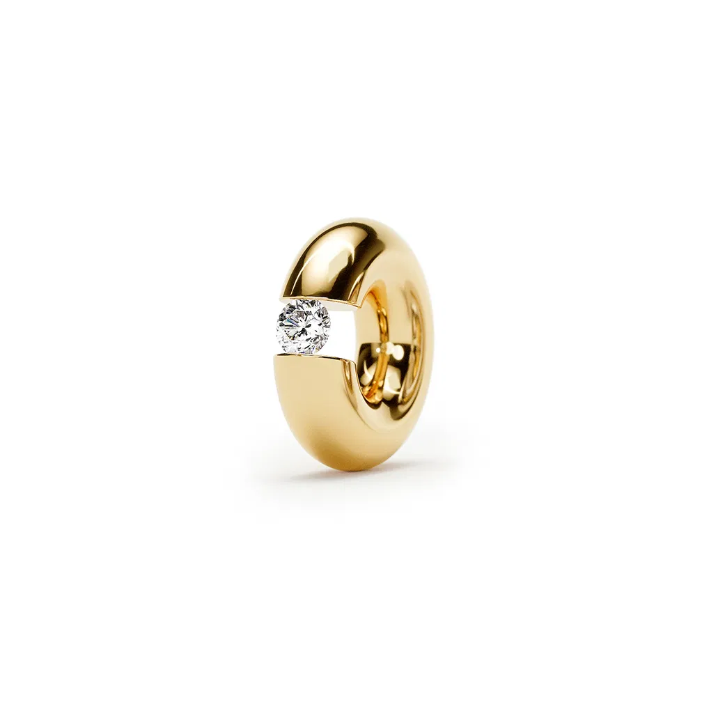 een 18 krt hanger geelgoud voor Niessing Colette armband model spanring met diamant briljant 0.01 crt  TW VS.
