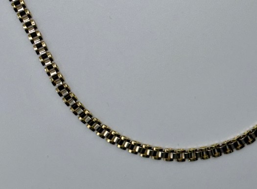 14 karaat bicolor geel- met witgouden collier Rolex schakel schakelbreedte 4,1 mm 50cm lang met karabijn sluiting.
