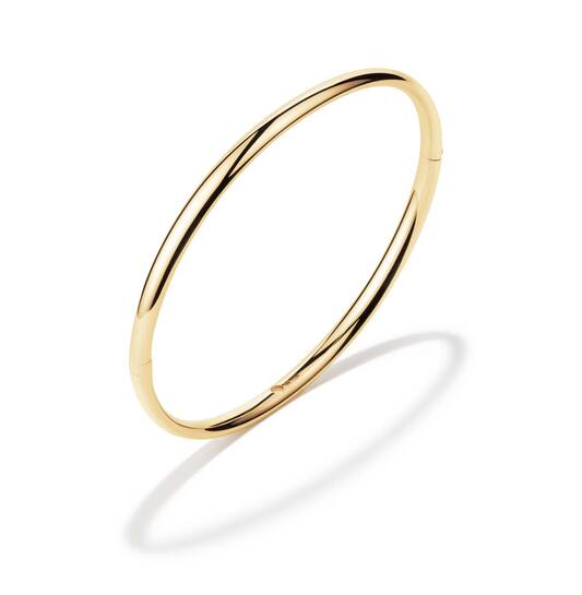 14k Geelgoud Bangle Armband verstevigd met een Sterling Zilveren kern met een draag diameter van 60 mm.

8,2 Gram 14k Goud
6,5 Gram Sterling Zilver

Beide edelmetalen zijn voorzien van een waarborg keurmerk stempel.